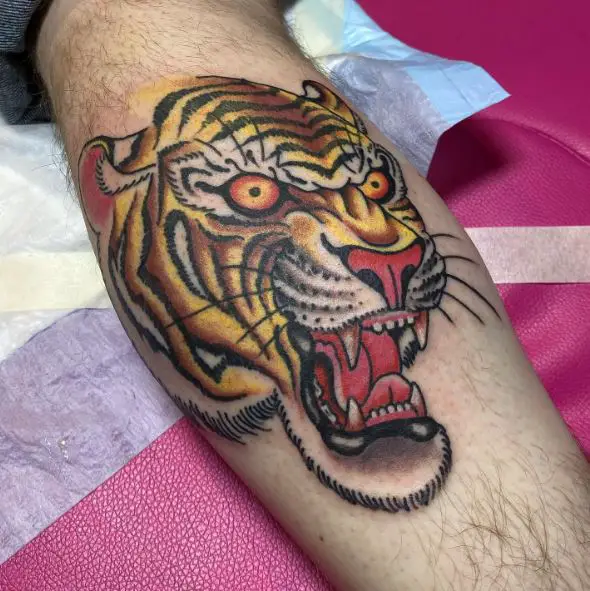 Angry Yellow Tiger Calf Tattoo