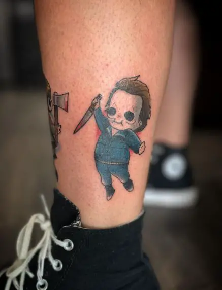 Colorful Little Michael Myers with Knife Leg Tattoo