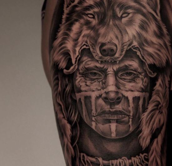 Black and Grey Sioux Warrior with Wolf Hat Arm Tattoo