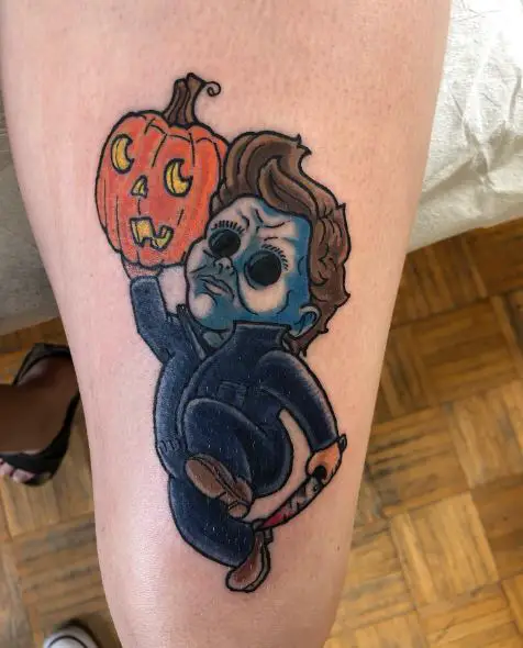 Colorful Little Michael Myers with Knife and Pumpkin Thigh Tattoo