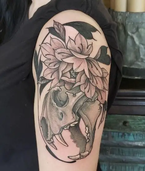Black and Grey Flowers and Lion Skull Arm Tattoo