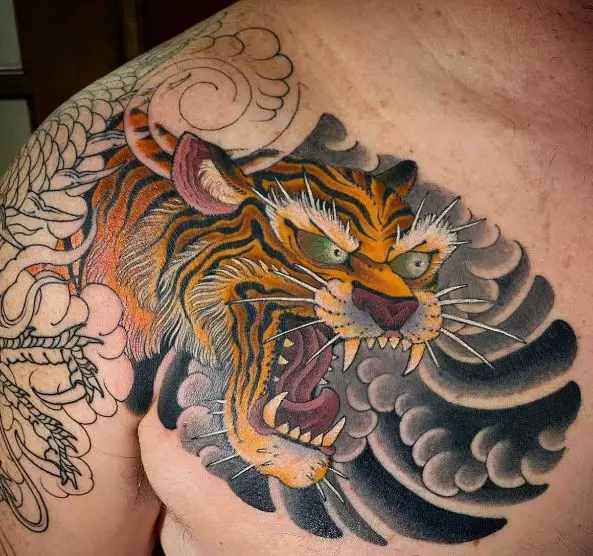 Traditional Roaring Japanese Tiger Chest Tattoo