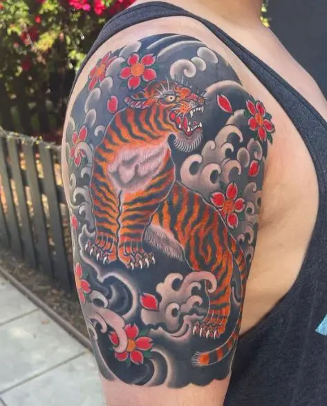 Red Flowers and Roaring Japanese Tiger Arm Tattoo