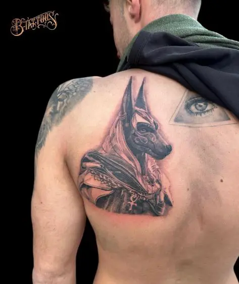 Black and Grey Anubis Back Tattoo