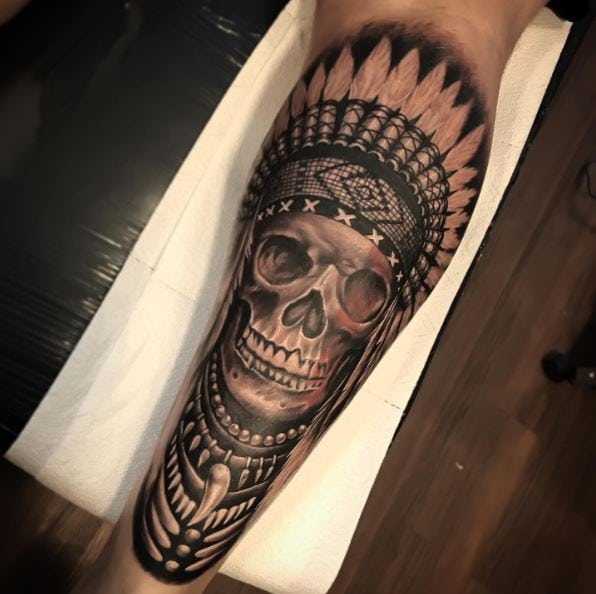 Skull with Apache Feather Headdress Forearm Tattoo