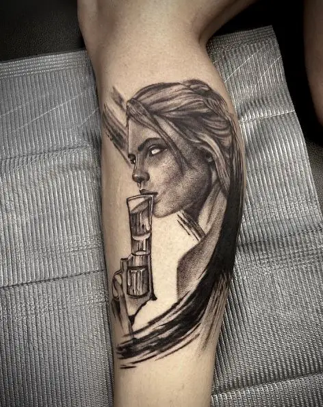 Woman Holding Gun with Glass Sobriety Leg Tattoo