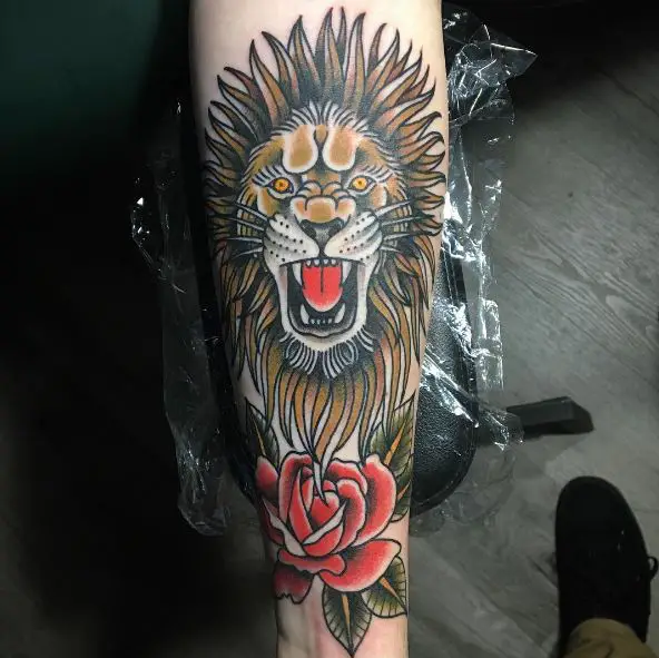 Red Rose and Traditional Roaring Lion Forearm Tattoo