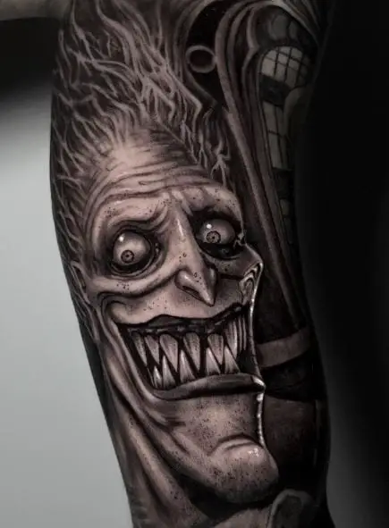 Disney Hades with Scary Teeth Arm Tattoo