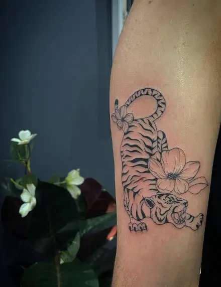 Flowers and Crouched Tiger Arm Tattoo