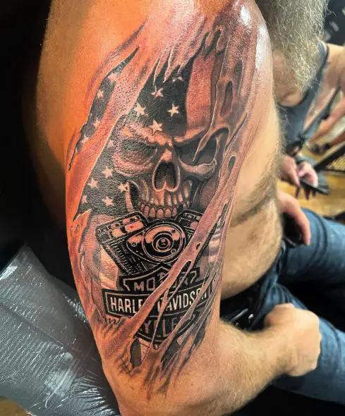 Ripped Skin Skull, and Harley Davidson Engine with Logo Arm Tattoo