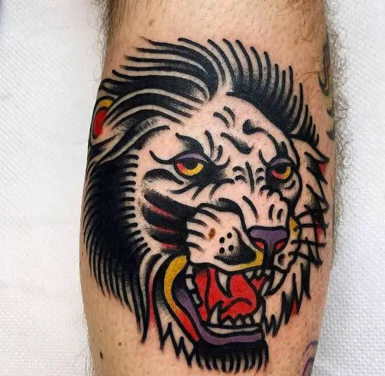 Colorful Traditional Lion Forearm Tattoo