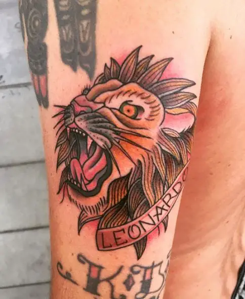 Colorful Traditional Lion with Name Banner Arm Tattoo