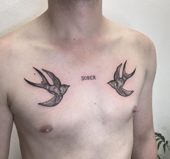 Two Swallows and Lettering Sober Chest Tattoo
