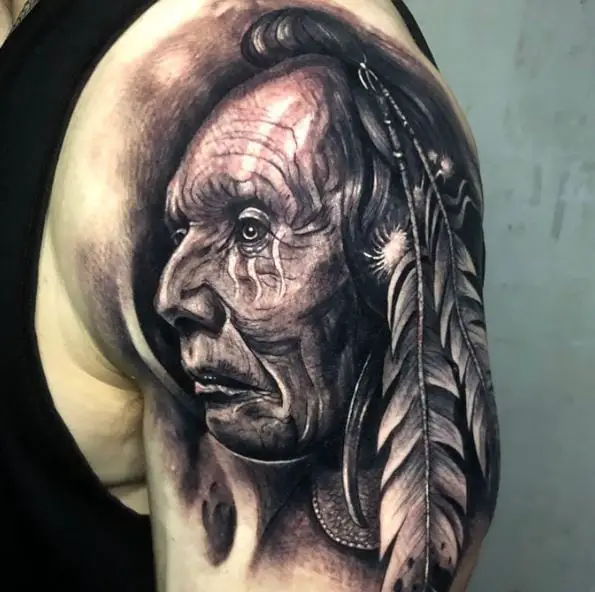 Realistic Native American with Feather Arm Tattoo