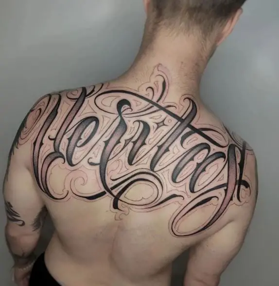 Veritas Script Back Tattoo