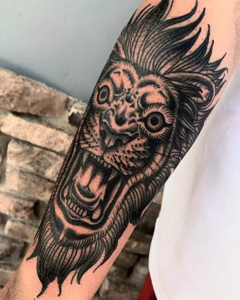 Black and Grey Traditional Roaring Lion Forearm Tattoo
