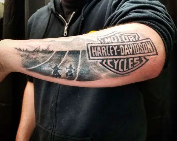 Black and Grey Harley Davidson Logo and Riders Forearm Tattoo