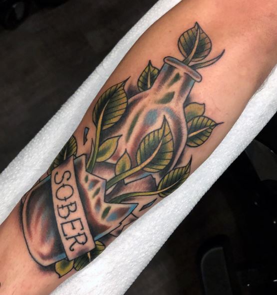 Broken Bottle, with Plants and Lettering Sober Forearm Tattoo