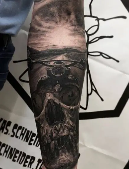 Black and Grey Skull and Harley Davidson on Open Road Forearm Tattoo