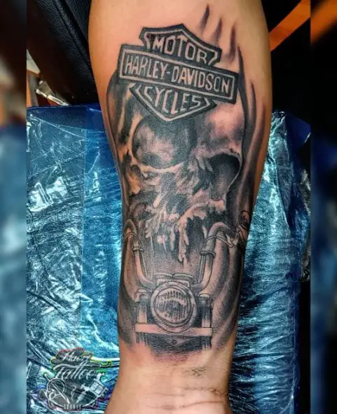 Skull, Harley Davidson Bike and Logo Forearm Tattoo