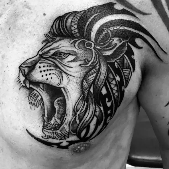 Black and Grey Tribal Lion Chest Tattoo