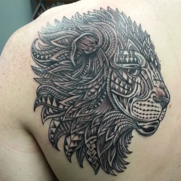 Black and Grey Tribal Ornamented Lion Back Tattoo