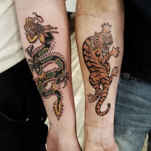 Colorful Dragon and Tiger Forearms Tattoo