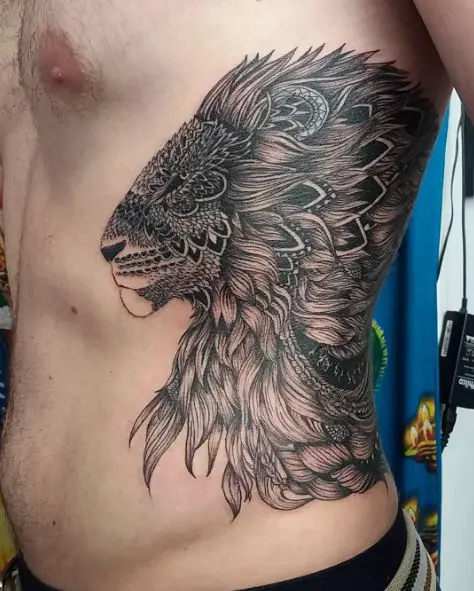 Black Shaded Tribal Lion Ribs Tattoo