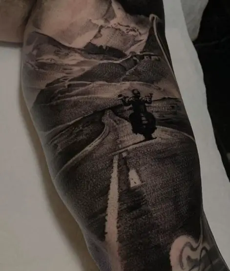 Black and Grey Open Road and Harley Davidson Rider Forearm Tattoo