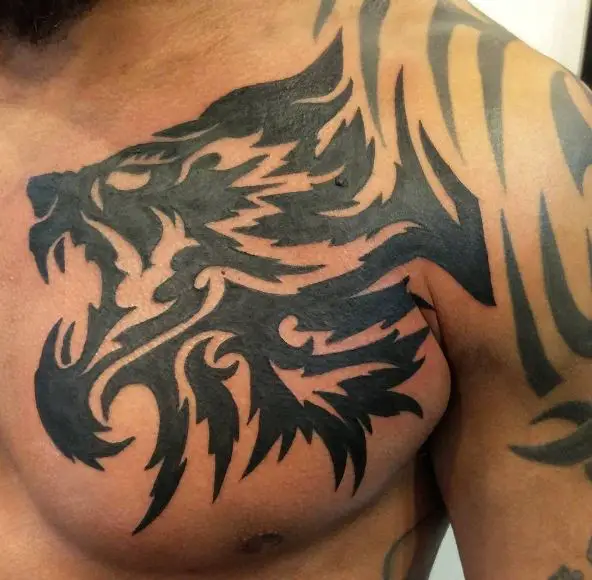 Black Tribal Lion Chest Tattoo