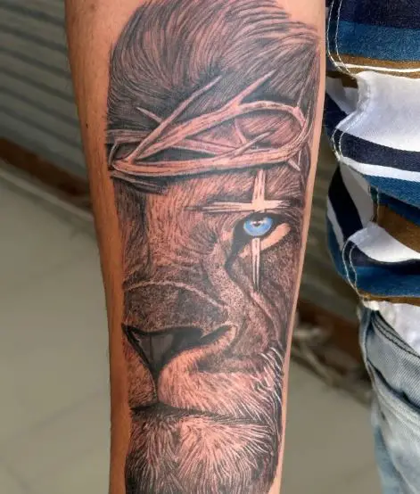 Black and Grey Lion with Thorn Crown Forearm Tattoo