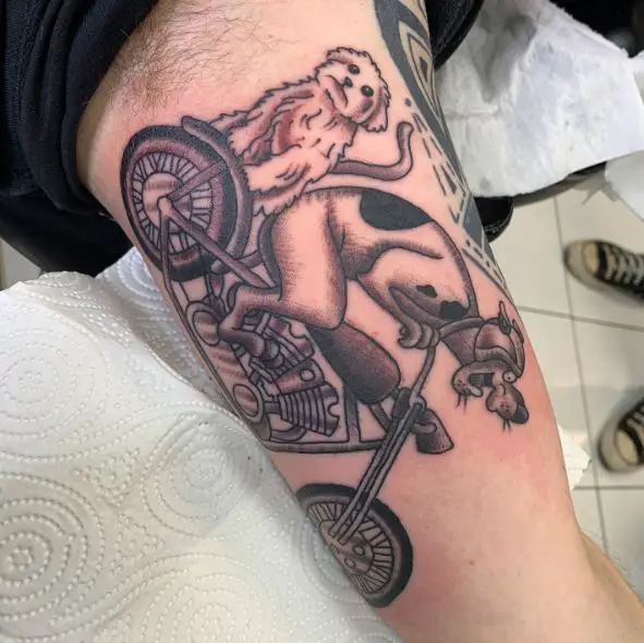 Black and Grey Two Dogs Riding Harley Davidson Inner Biceps Tattoo