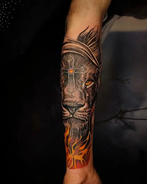 Black and Grey Lion Head with Cross Forearm Tattoo