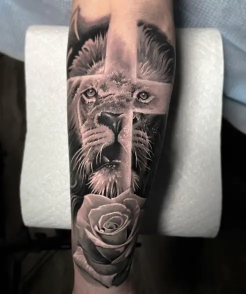 Rose, Cross and Lion Head Forearm Tattoo