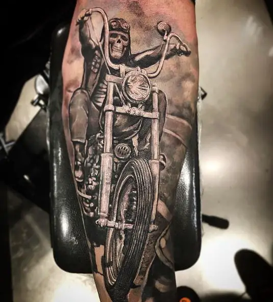 Black and Grey Skeleton Riding Harley Davidson Forearm Tattoo