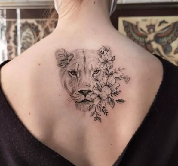 Black and Grey Flowers and Lioness Back Tattoo