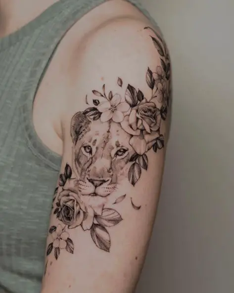 Black and Grey Flowers and Lioness Arm Tattoo
