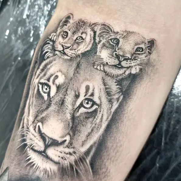 Grey Shaded Lioness with Cubs Forearm Tattoo