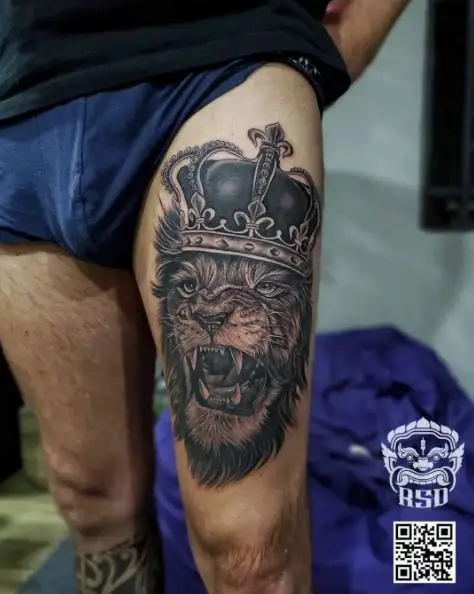 Roaring Lion with Crown Thigh Tattoo