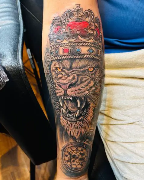 Colorful Clock and Roaring Lion with Crown Forearm Tattoo