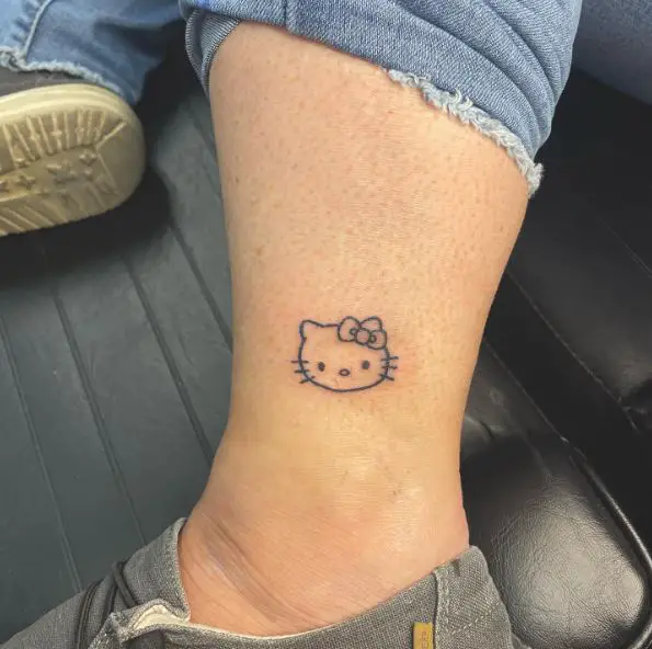 Black Minimalistic Hello Kitty Head Ankle Tattoo