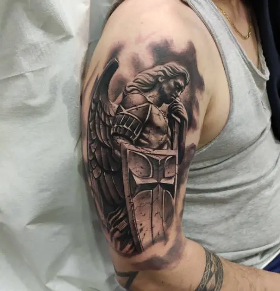 Black and Grey Shaded Saint Michael with Shield and Sword Arm Tattoo