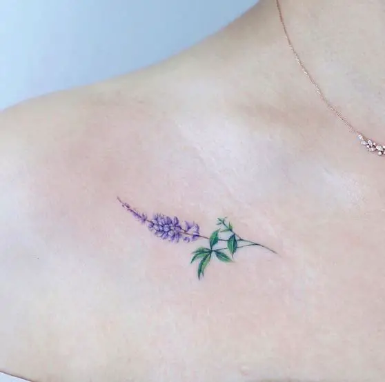 Colorful Minimalistic Lavender Flower Collarbone Tattoo