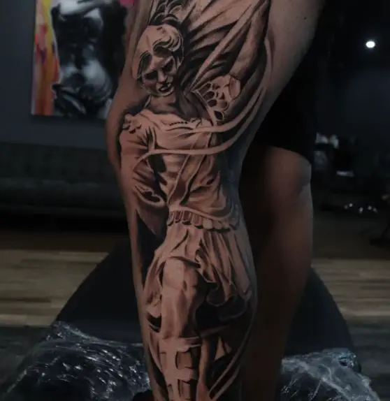 Black and Grey Saint Michael with Sword Leg Tattoo