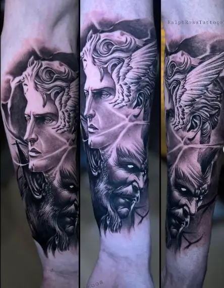 Black and Grey Devil and Saint Michael Forearm Tattoo