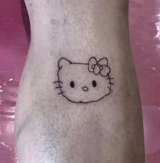 Minimalistic Hello Kitty Head Leg Tattoo