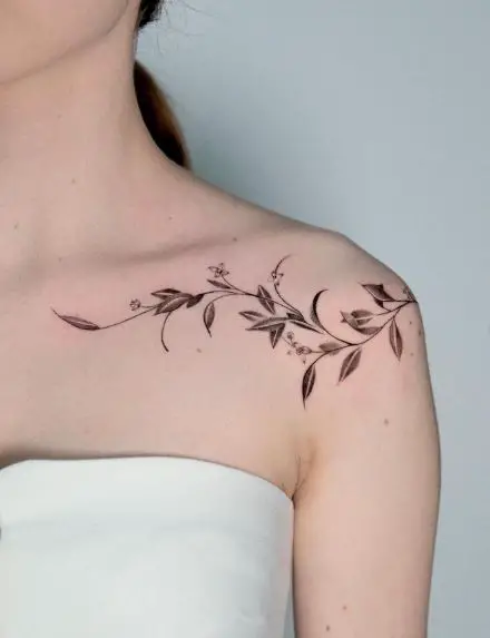 Black and Grey Olive Branches with Leaves and Flowers Collarbone Tattoo