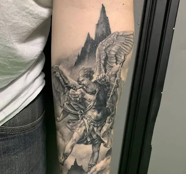 Mountain Peak and Saint Michael with Sword and Wings Forearm Tattoo