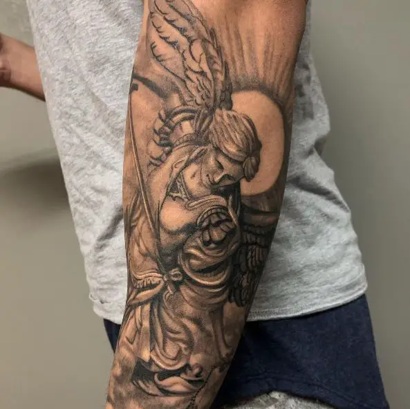 Black and Grey Saint Michael with Spear and Wings Forearm Tattoo