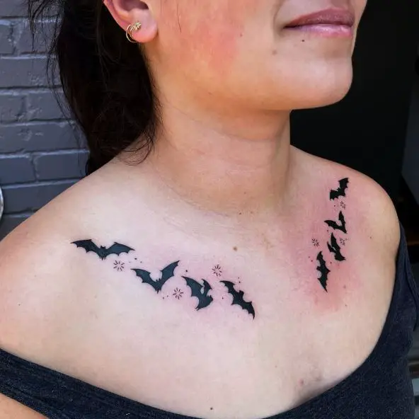 Stars and Black Bats Collarbone Tattoo